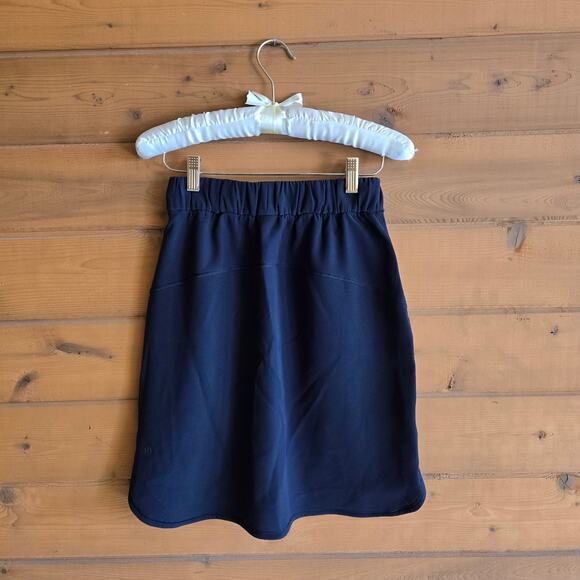 Lululemon On The Fly Skirt Woven Black Size 4 Elastic Drawstring Pocket Bottom - Picture 2 of 7